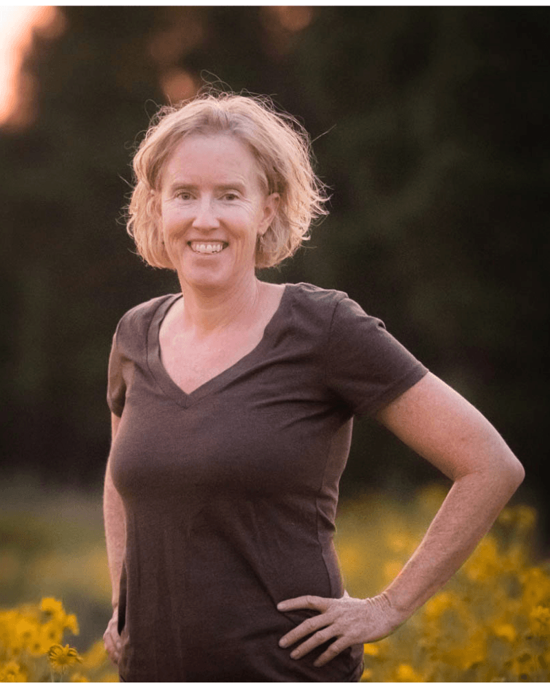 Woman over 40 feeling strong and confident after ThriveHer coaching