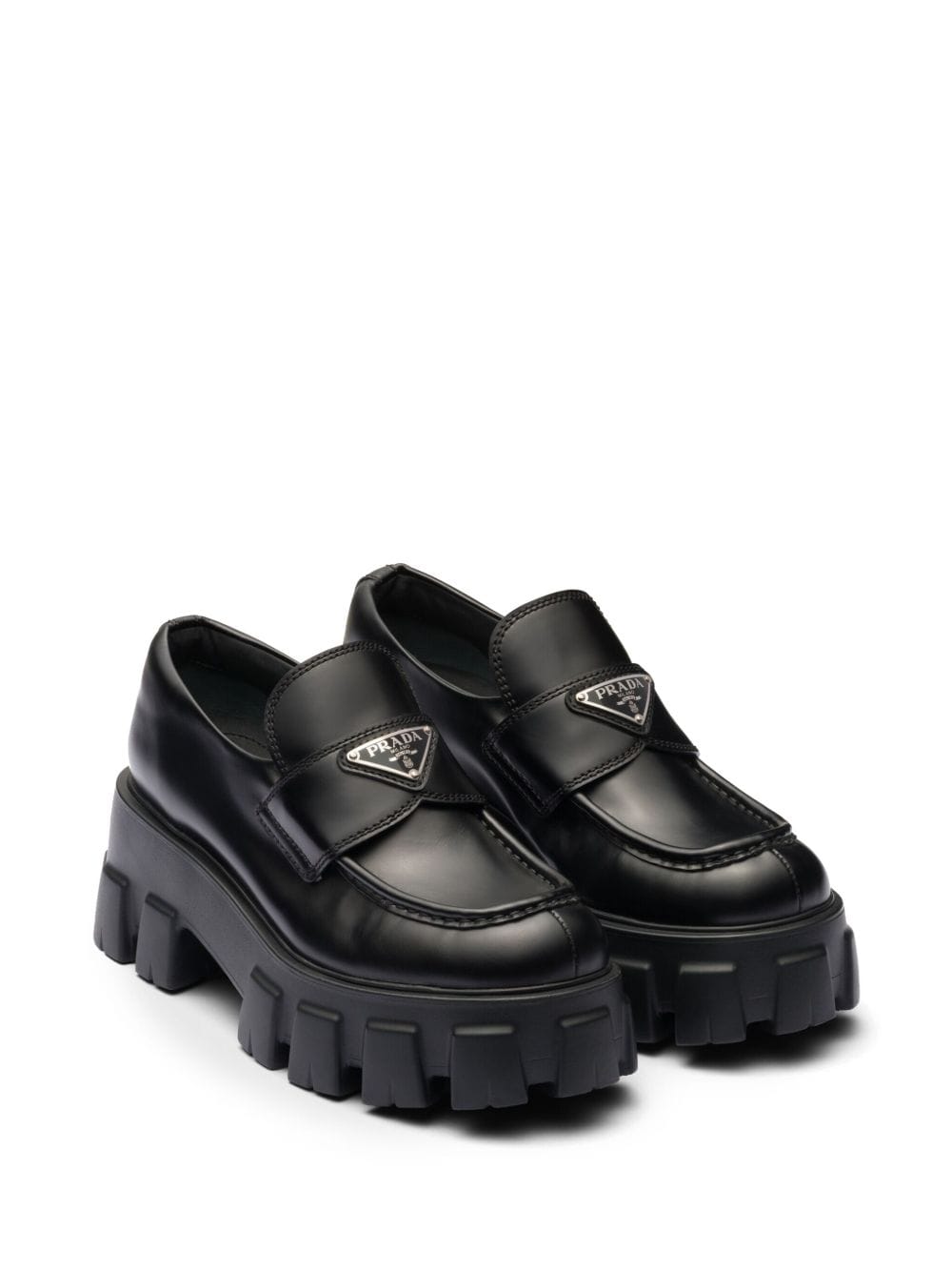 Prada Monolith loafer black calfskin platform sole — luxury investment shoes women 2026 — aecreativ.eu