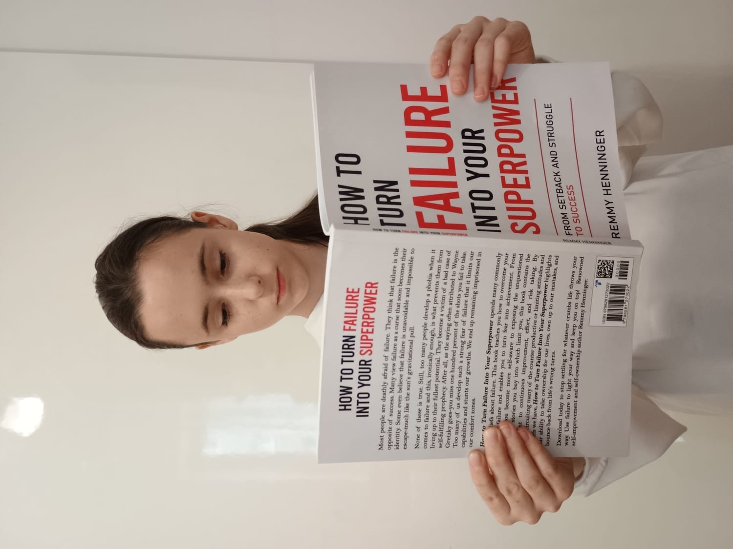 Young Woman reading How to Turn Failure into Your Superpower Paperback