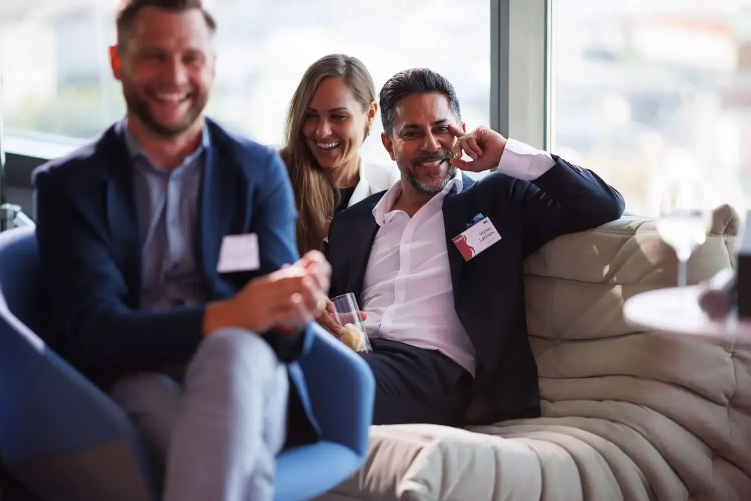 Entrepreneurs networking at a luxury business reception