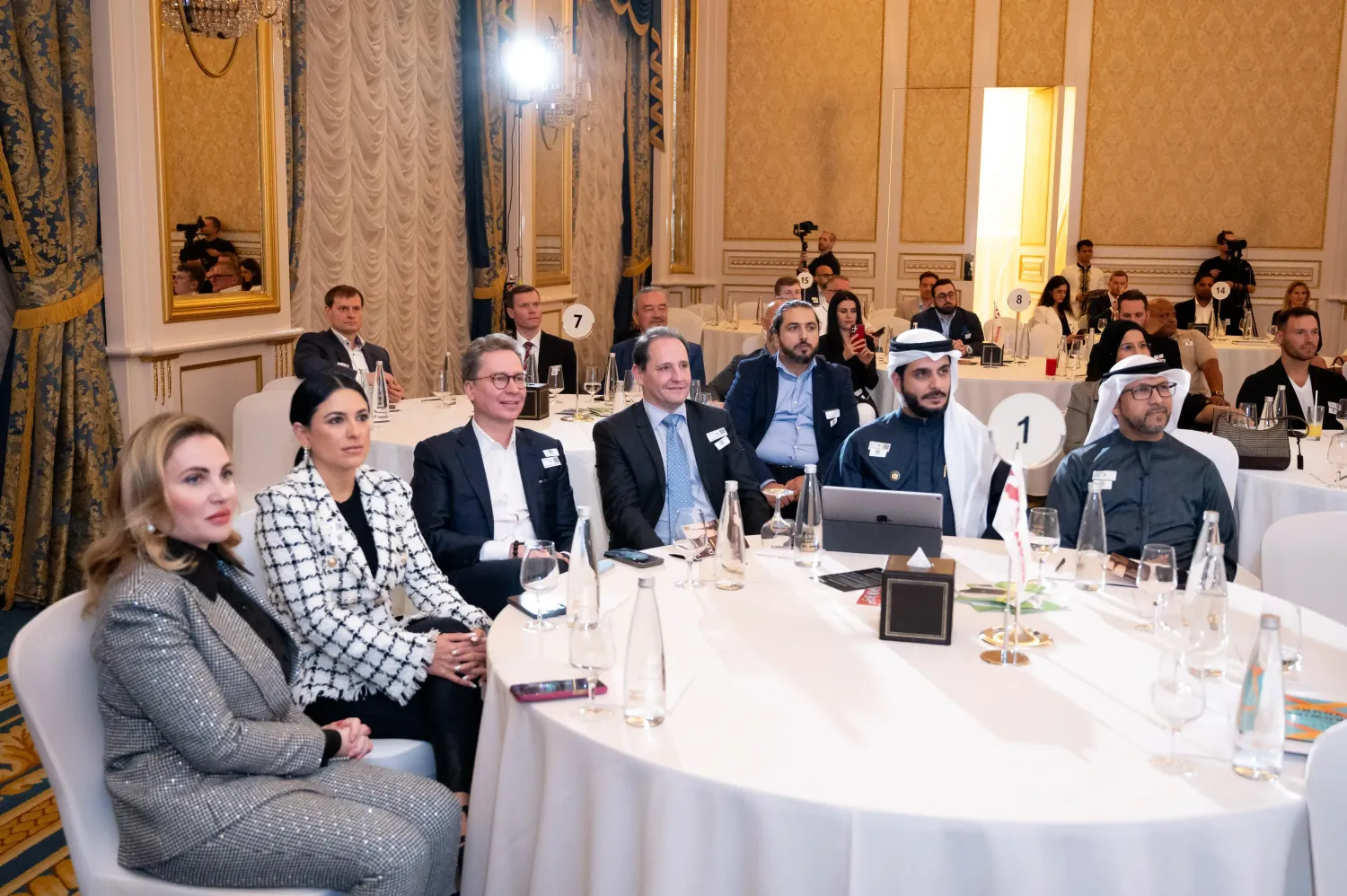 Attendees at a luxury business reception