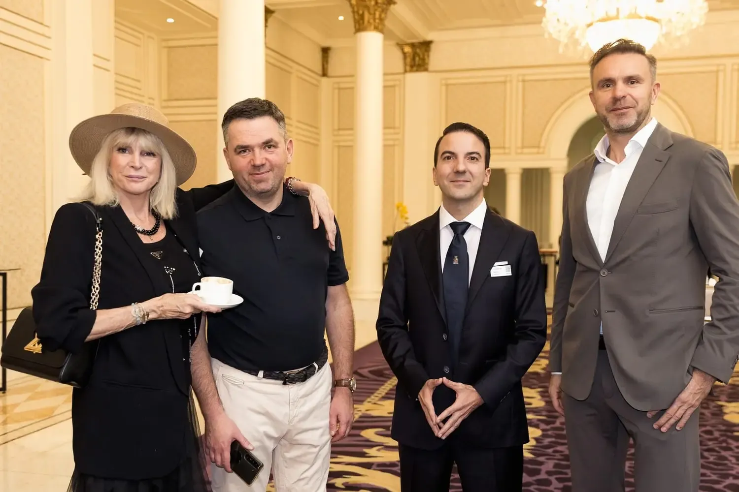 Attendees at a luxury business reception