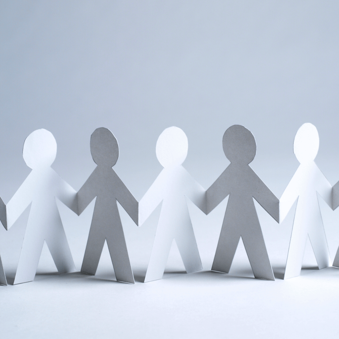 Picture of crafted paper characters holding hands, representing Paper Doll Penpals community.