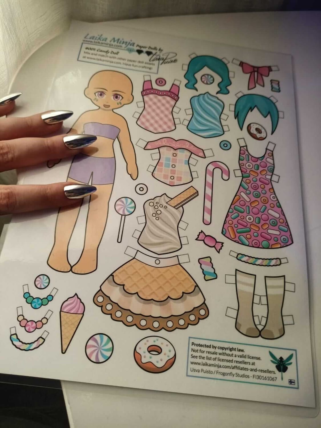 Printed and laminated Laika Minja Paper Doll Kit