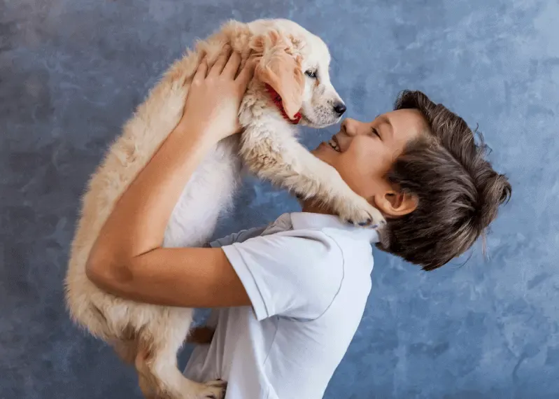 boy with puppy