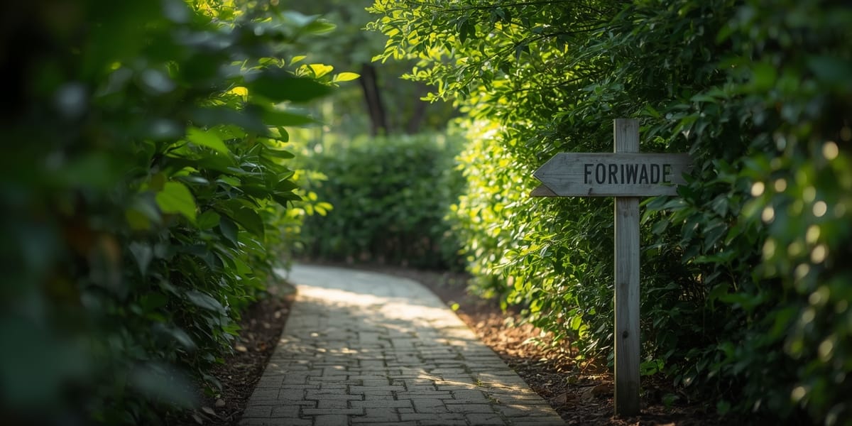 simple garden path sign pointing forward green leaves soft light