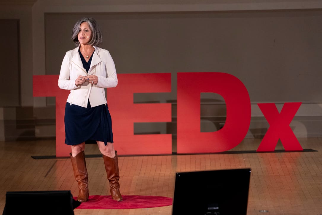 Joelle Kaufman on the TEDx stage