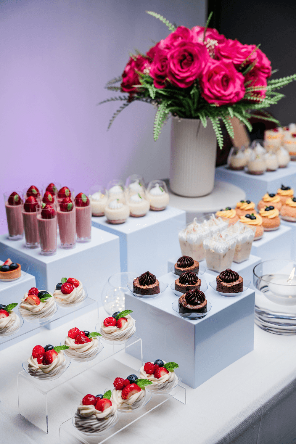 Dessert table with mini brownie and tres leches 