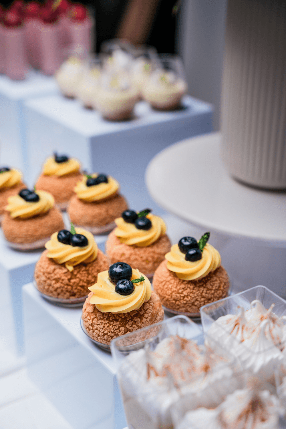 Mini cream puffs on a dessert table – Sweet Bite Tulsa