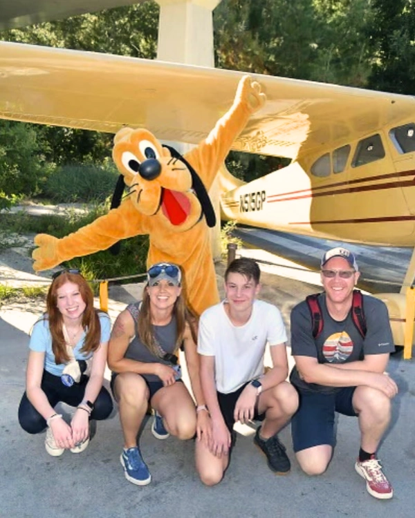 coach tina adkison with her family