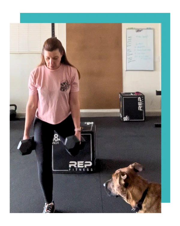 coach tina adkison doing some leg resistance training with their dog beside her