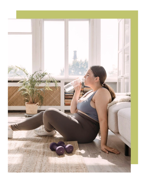 woman tired from working out at home