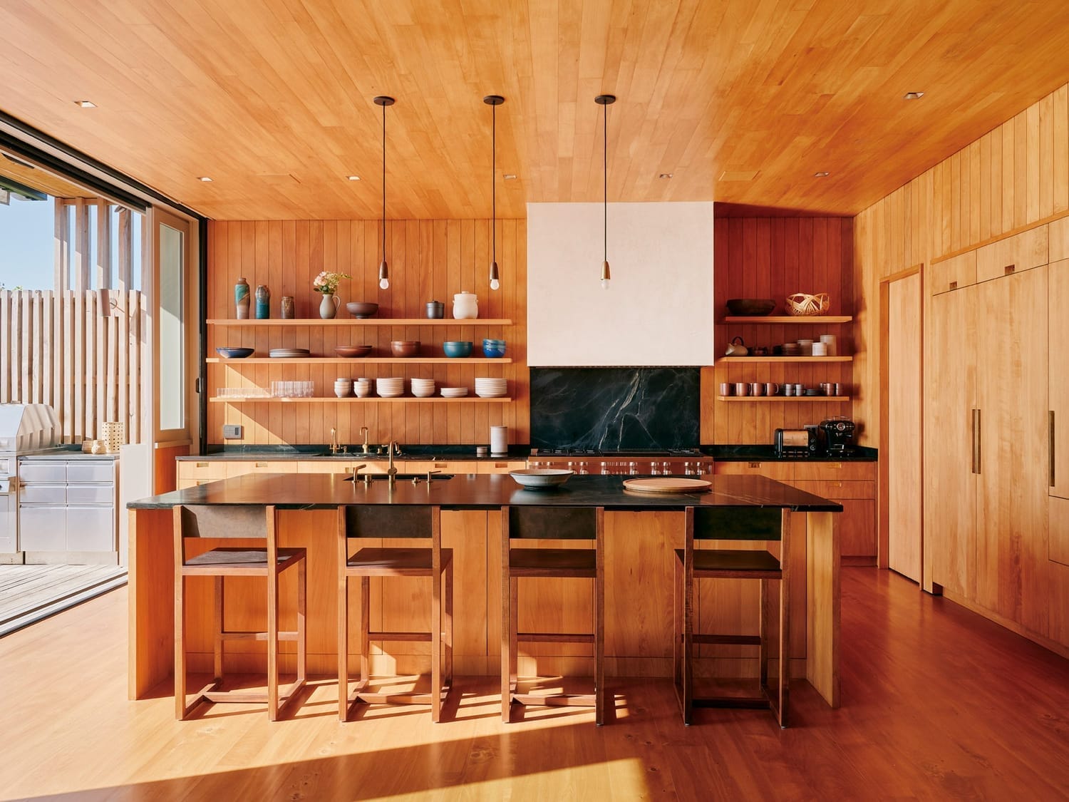 Kitchen with large swathes of wood elements