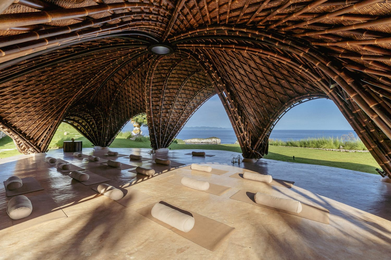 Undulating bamboo roofs modelled on seashells, fish and manta rays provide shelter for facilities across this wellness retreat in Indonesia, designed by Balinese practice Pablo Luna Studio.