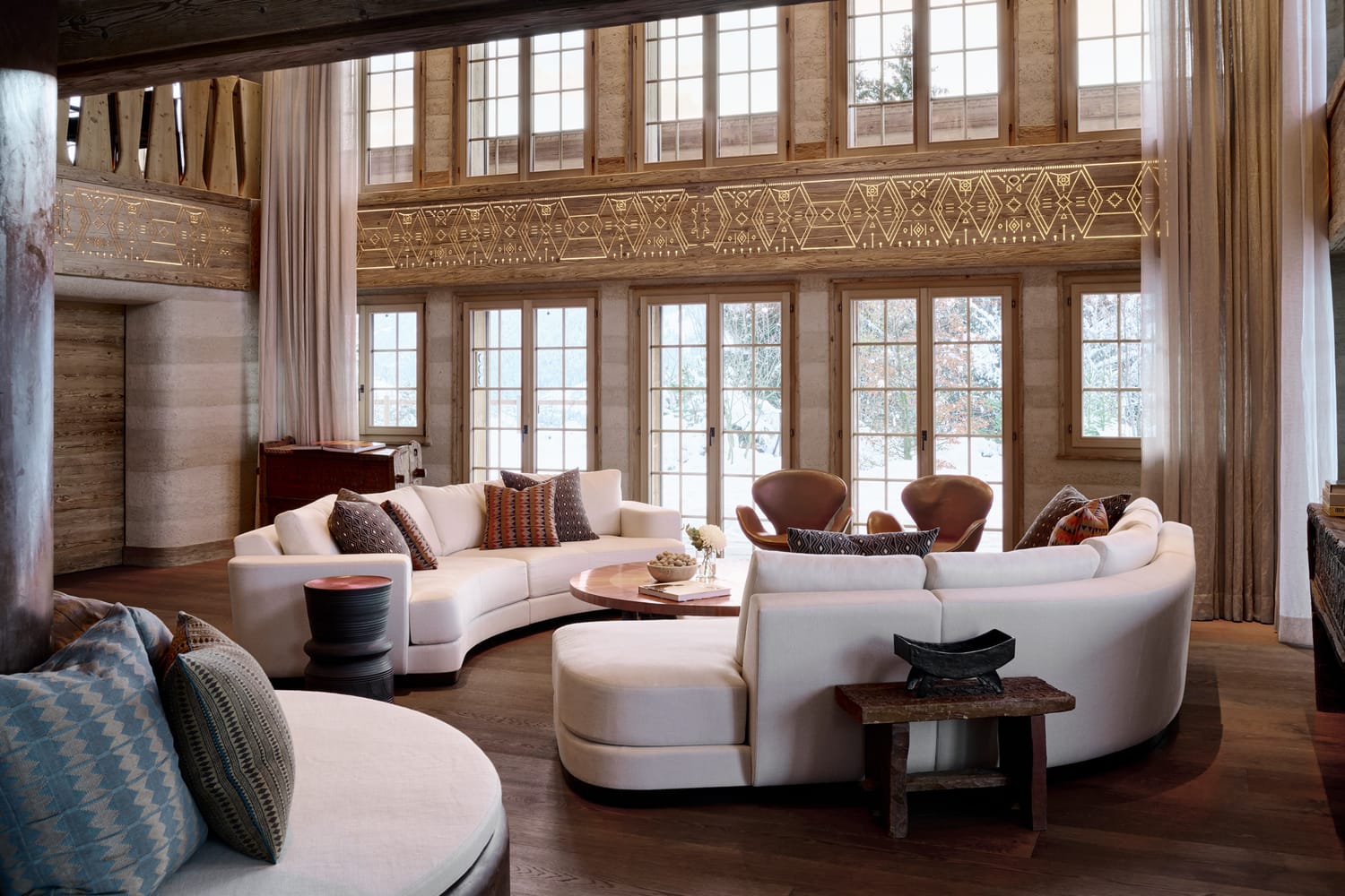 Wood carvings wrap around the living space