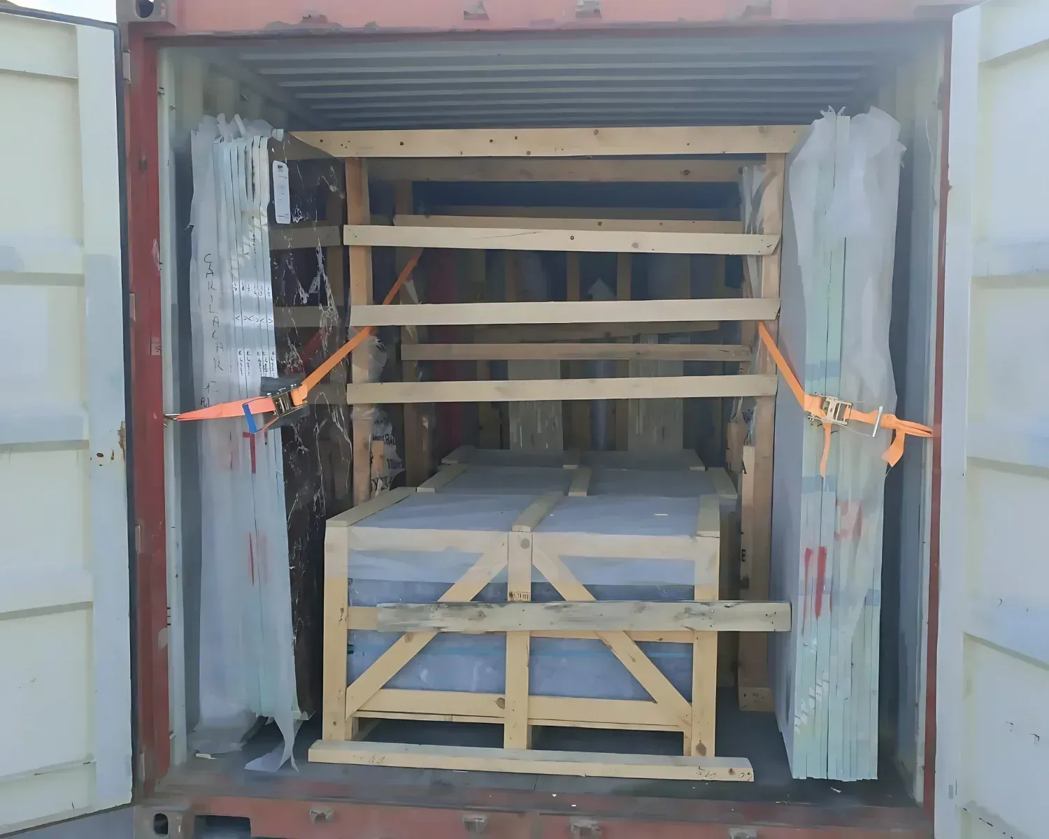 Airbags and timber bracing protecting Soft Beige pieces in transit